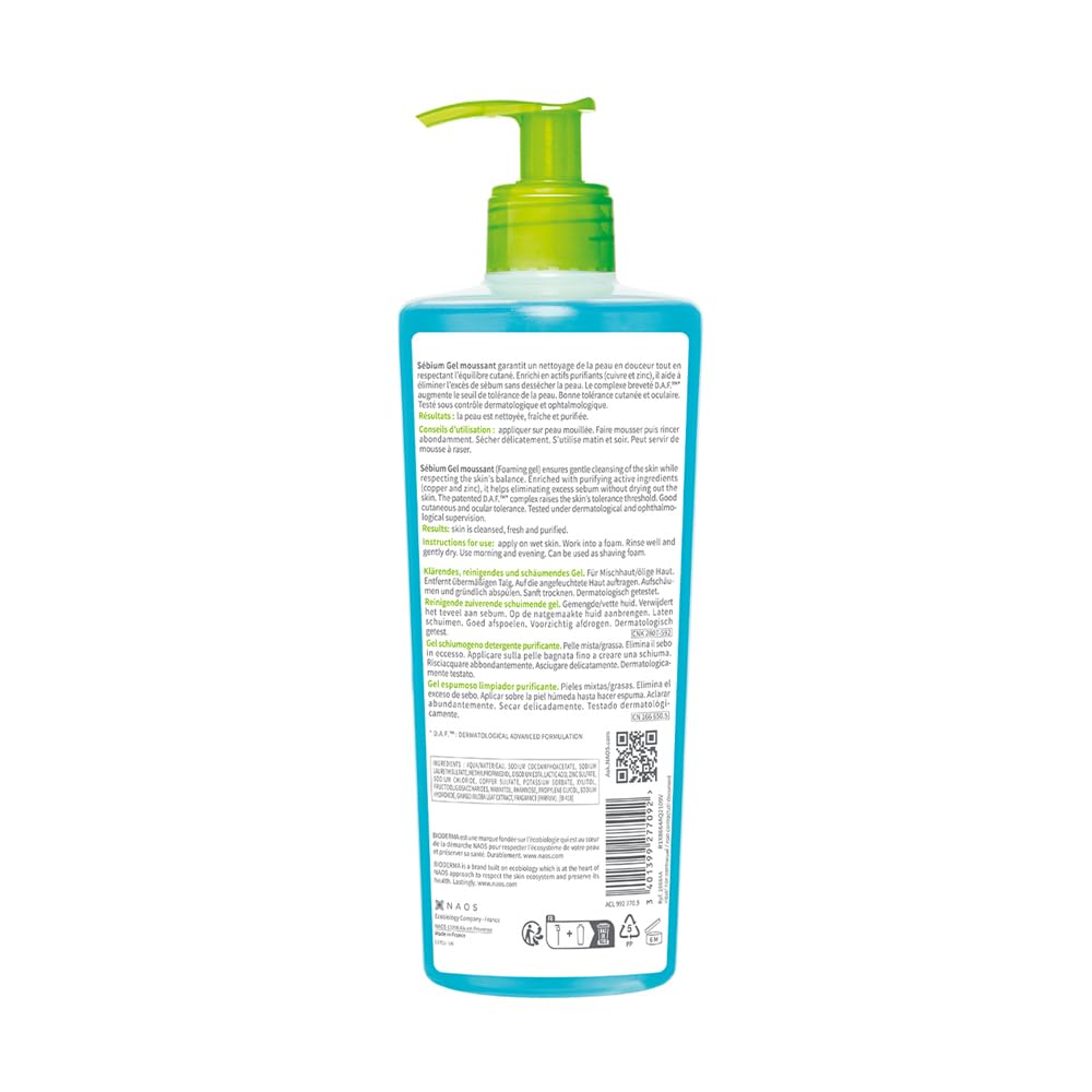 Bottle with pump and label on a white background