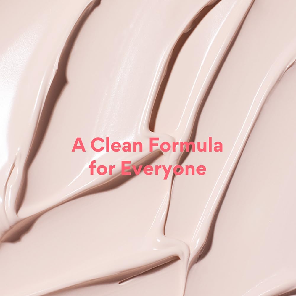 Close-up of beige cream with text 'A Clean Formula for Everyone' on a beige background