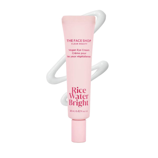 Pink tube of The Face Shop Rice Water Bright Vegan Eye Cream on a white background