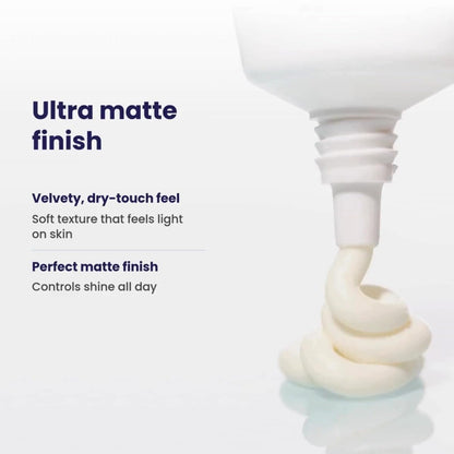 White cream being squeezed onto a white surface with text describing its finish and texture.