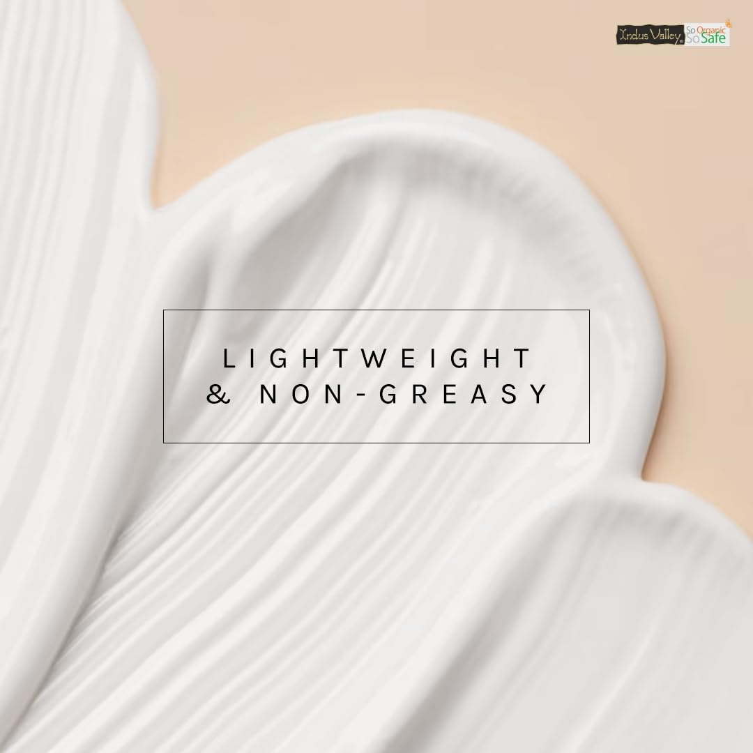 White fabric with 'Lightweight & Non-Greasy' text on a beige background