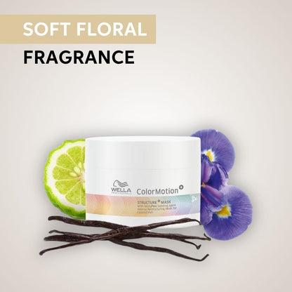 Wella ColorMotion mask with vanilla beans and flowers on a light background