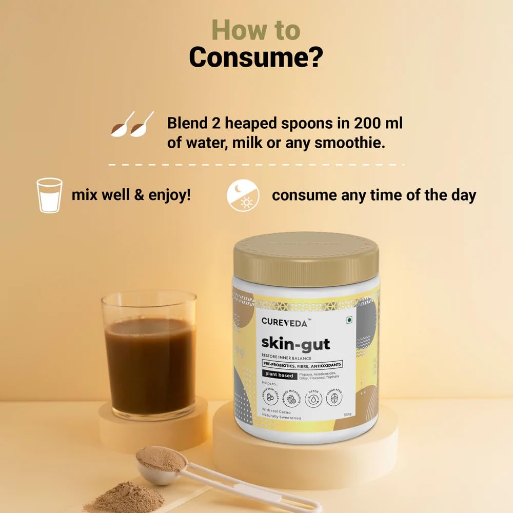 CureVeda skin-gut supplement container with a glass of dark liquid and spoon on a beige background