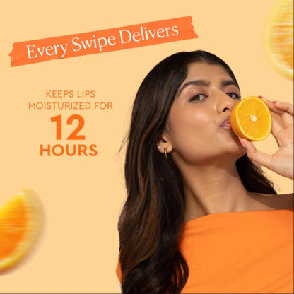 Woman holding an orange slice near her lips with promotional text on a beige background