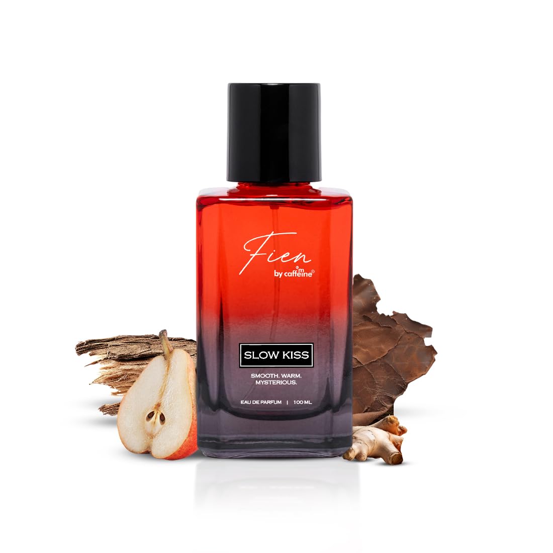 Perfume bottle labeled 'Fien' with a red and black design, surrounded by dried elements on a white background.