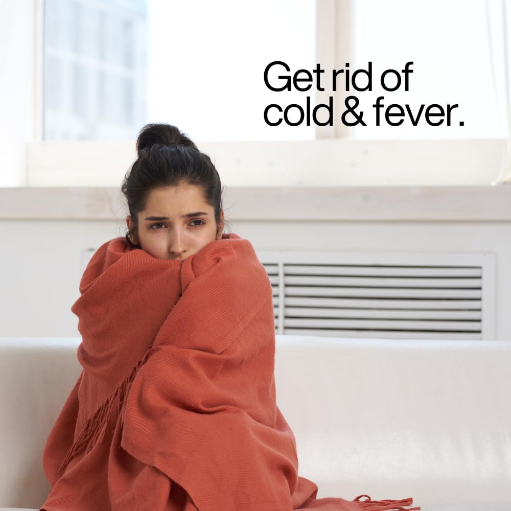 Person wrapped in a red blanket on a couch with text 'Get rid of cold & fever.'
