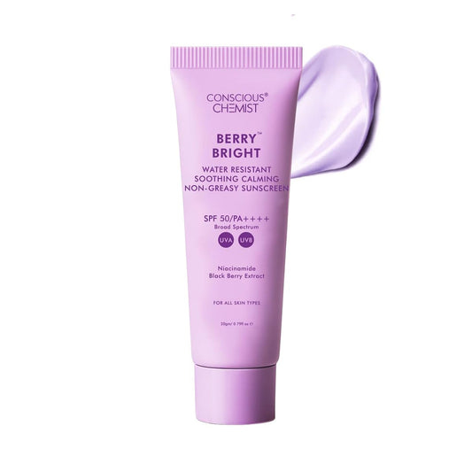 Purple sunscreen tube labeled 'Conscious Chemist Berry Bright' on a white background