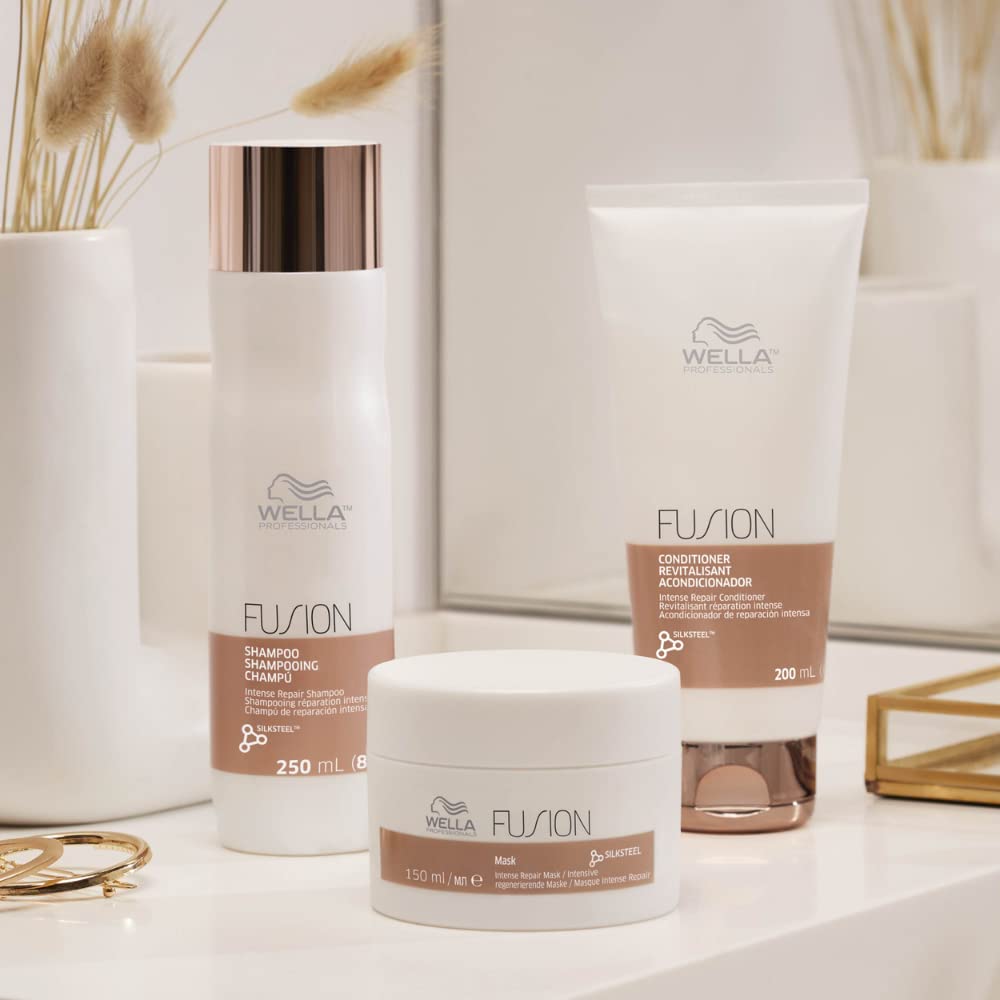 Wella Fusion hair care products on a neutral background