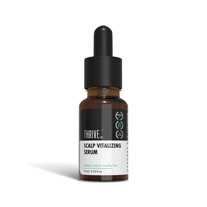 Thrive scalp vitalizing serum bottle with dropper on a white background