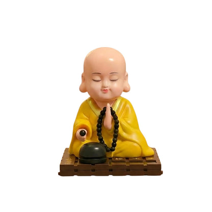 eCraftIndia Little Cute Buddha Monk Feng Shui Showpiece for Home Decor Office Car Dashboard | Moving Head and Hand Monk Buddha Statue for Positive Energy Money Luck Prosperity Gift (Plastic, Yellow)
