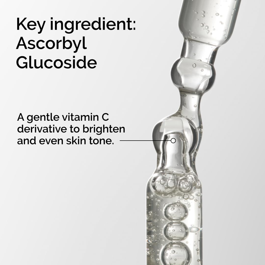 Vial of skincare product with text about ascorbyl glucoside and its benefits.