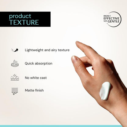 Hand with a small amount of cream on a light background, showcasing product texture features.
