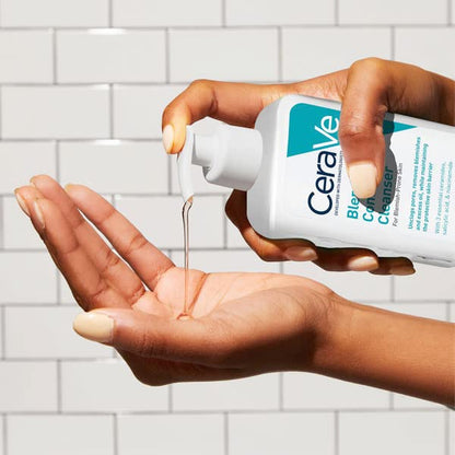 CeraVe cleanser being poured onto a hand with a tiled background
