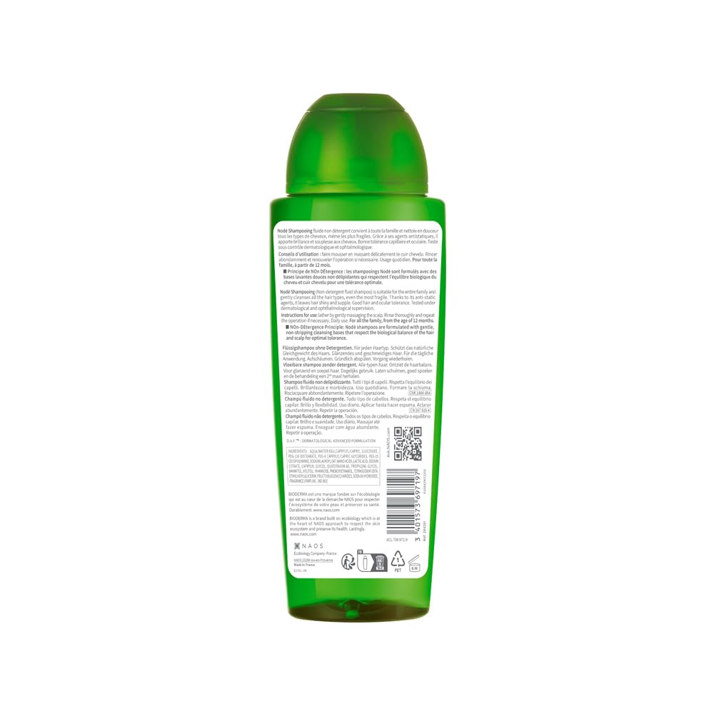 Green bottle with label on a white background