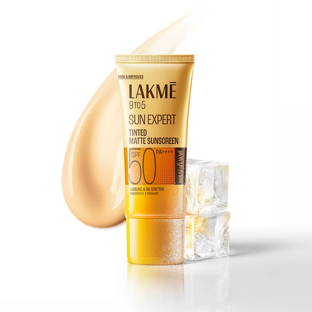 Lakme Sun Expert sunscreen tube with a glass of water on a white background