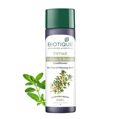 Biotique Thyme Volume & Bounce Conditioner bottle with green leaves on a white background