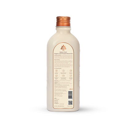 Bottle of Balms & Co. Organic Cold Pressed Almond Oil with a copper cap on a white background