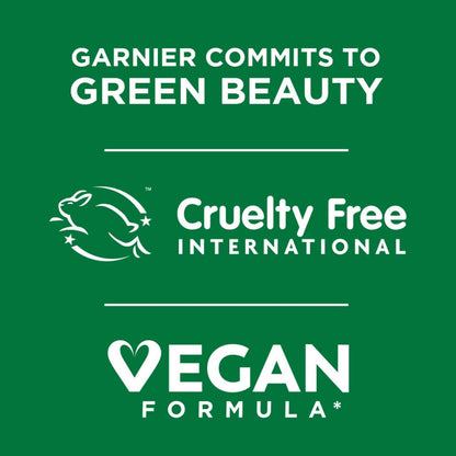 Garnier's commitment to green beauty with cruelty-free and vegan formula logos on a green background.
