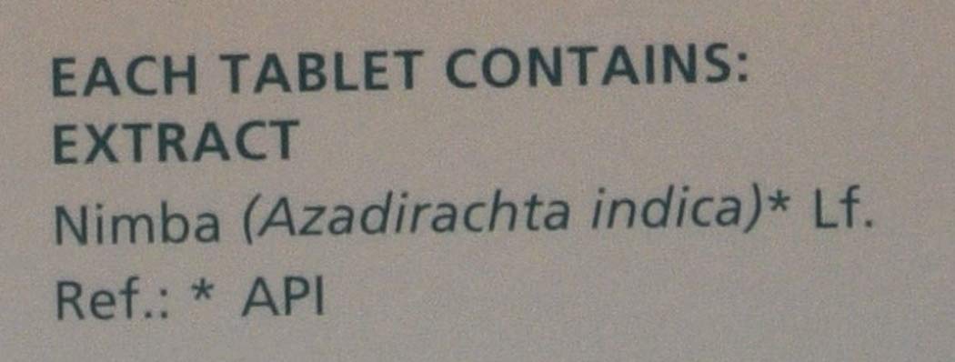 Text on a beige background indicating the contents of each tablet with Nimba extract.