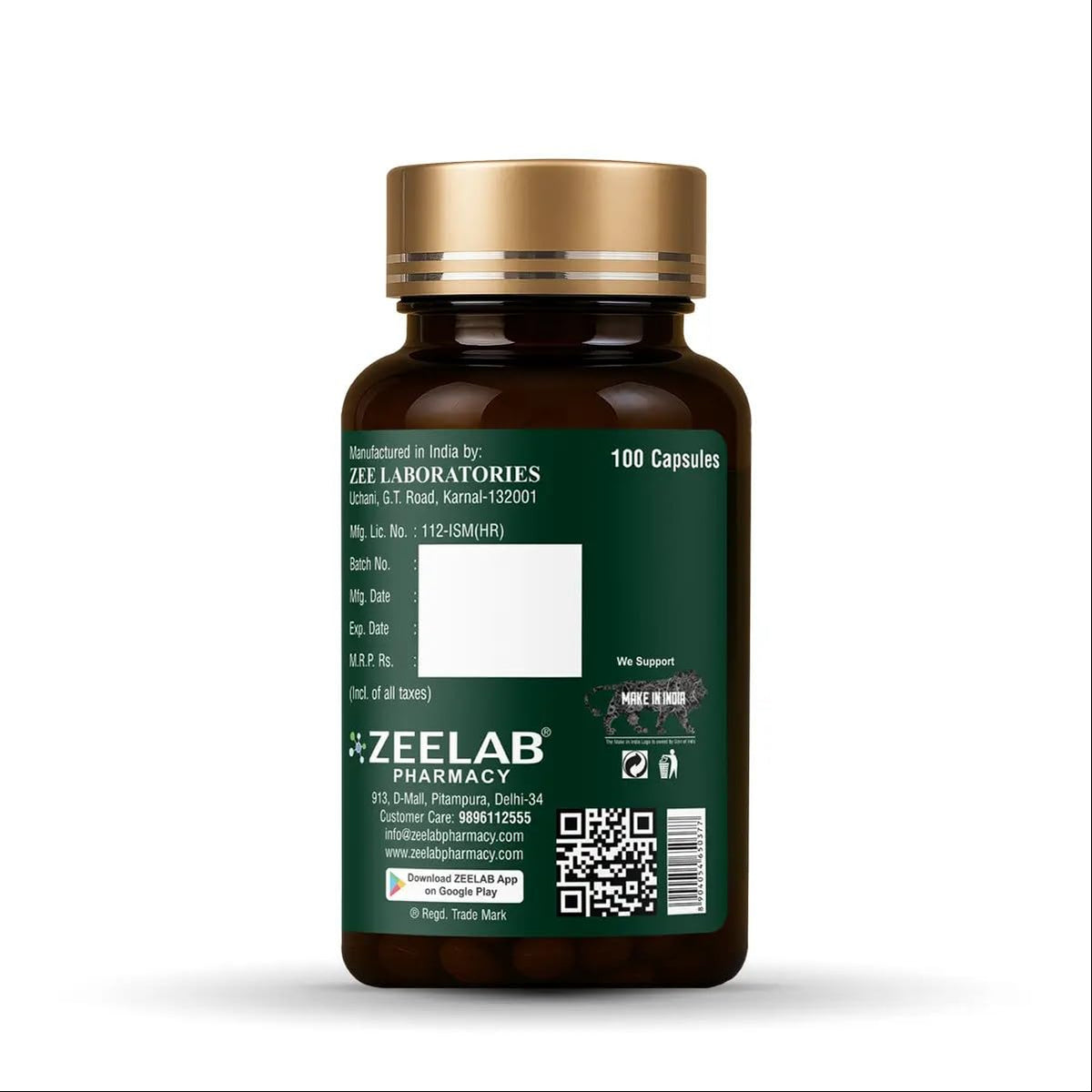 Bottle of capsules with a gold cap and green label on a white background
