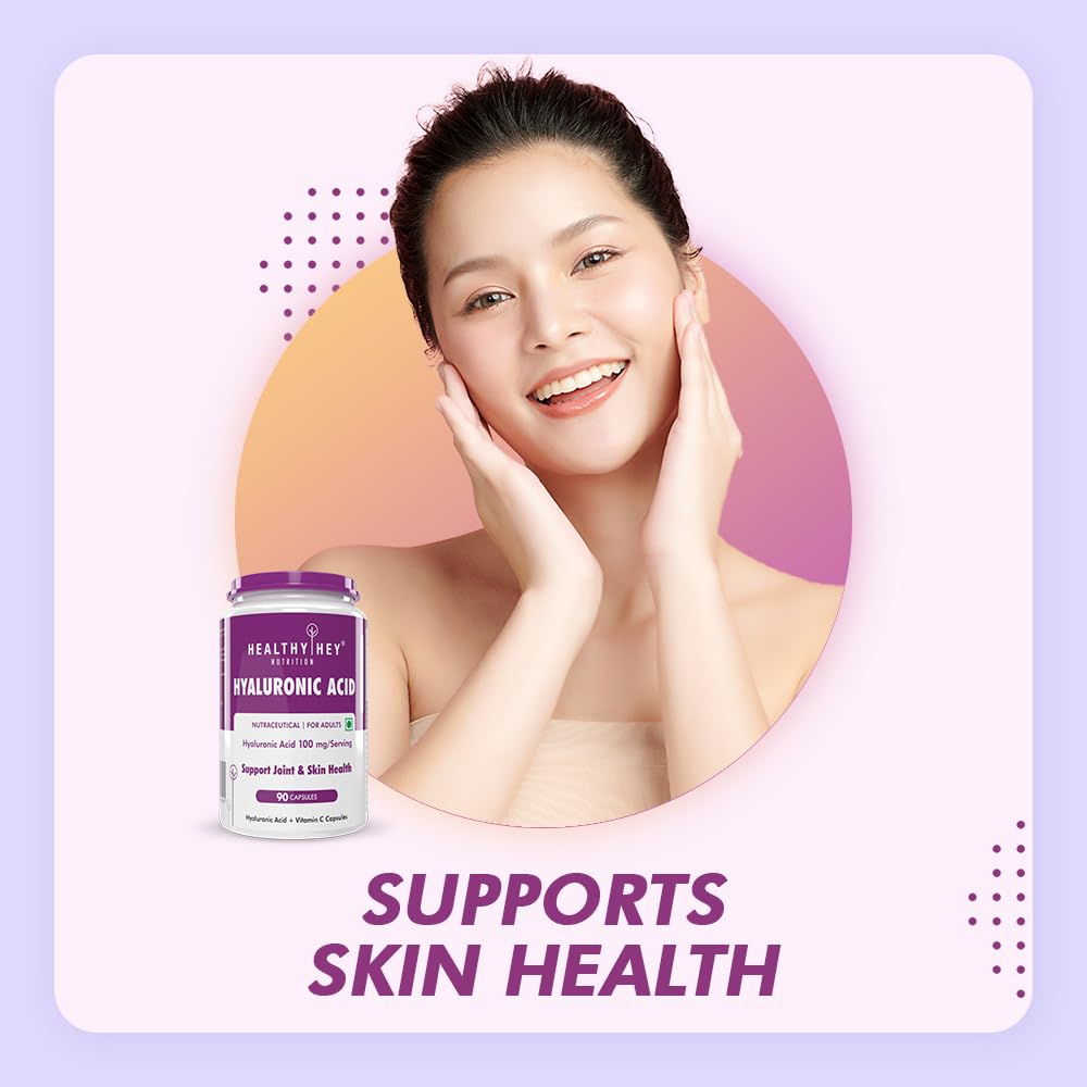 Woman with hands on face next to a bottle of Healthy维E Hyaluronic Acid on a light purple background
