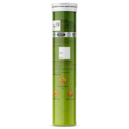 Green supplement tube with labels on a white background