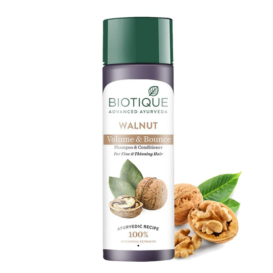Biotique Walnut Volume & Bounce shampoo bottle with walnut and leaf graphics on a white background
