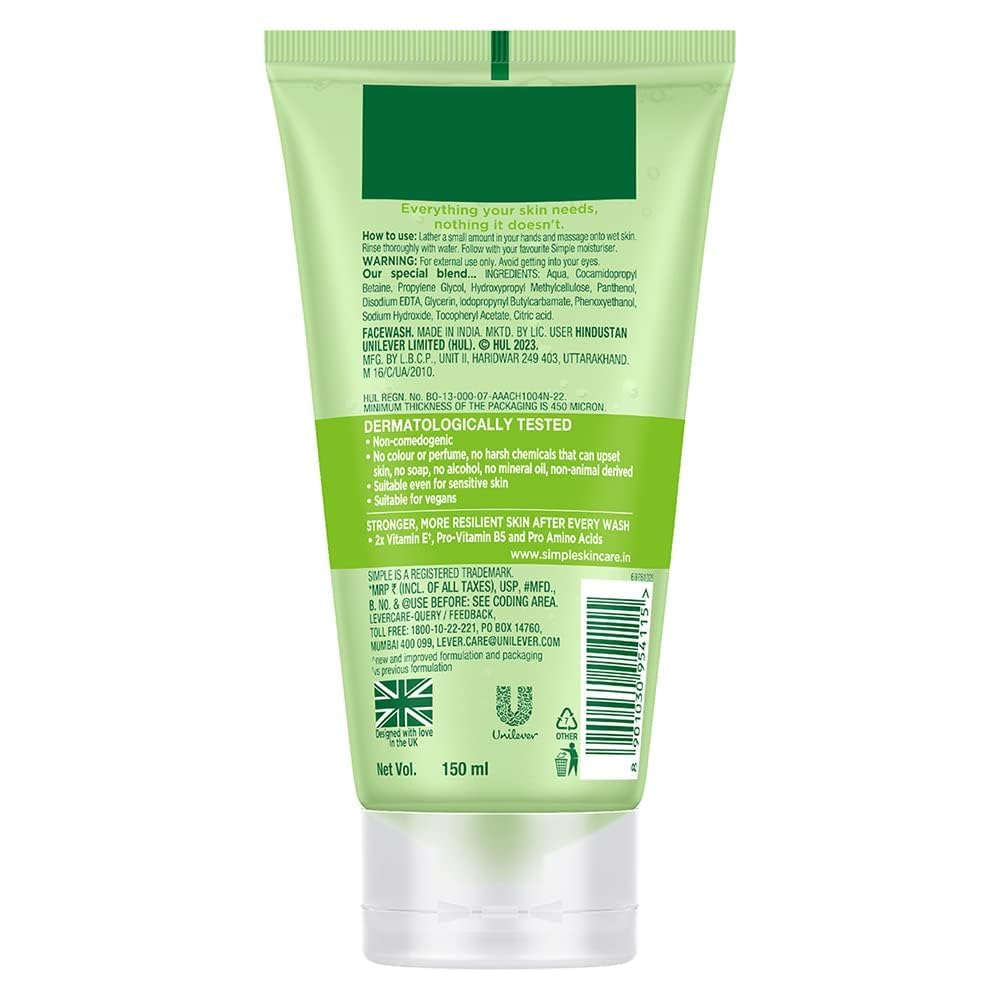Green skincare product tube with label on a white background