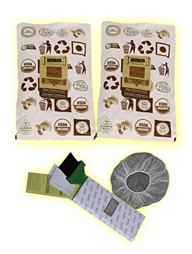 Two packages of organic coffee with a coffee filter and scoop on a white background