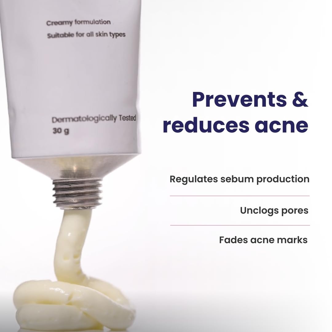 Skincare tube with cream flowing out, labeled for acne prevention and reduction.
