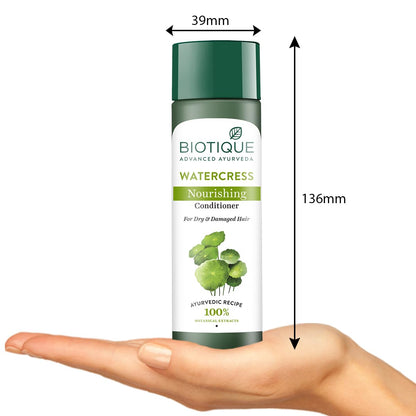 Biotique Watercress Nourishing Conditioner bottle shown on a palm with measurements.