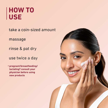 Woman applying cream to her face with skincare instructions on a beige background
