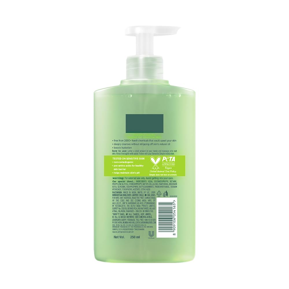 Green bottle with pump on a white background