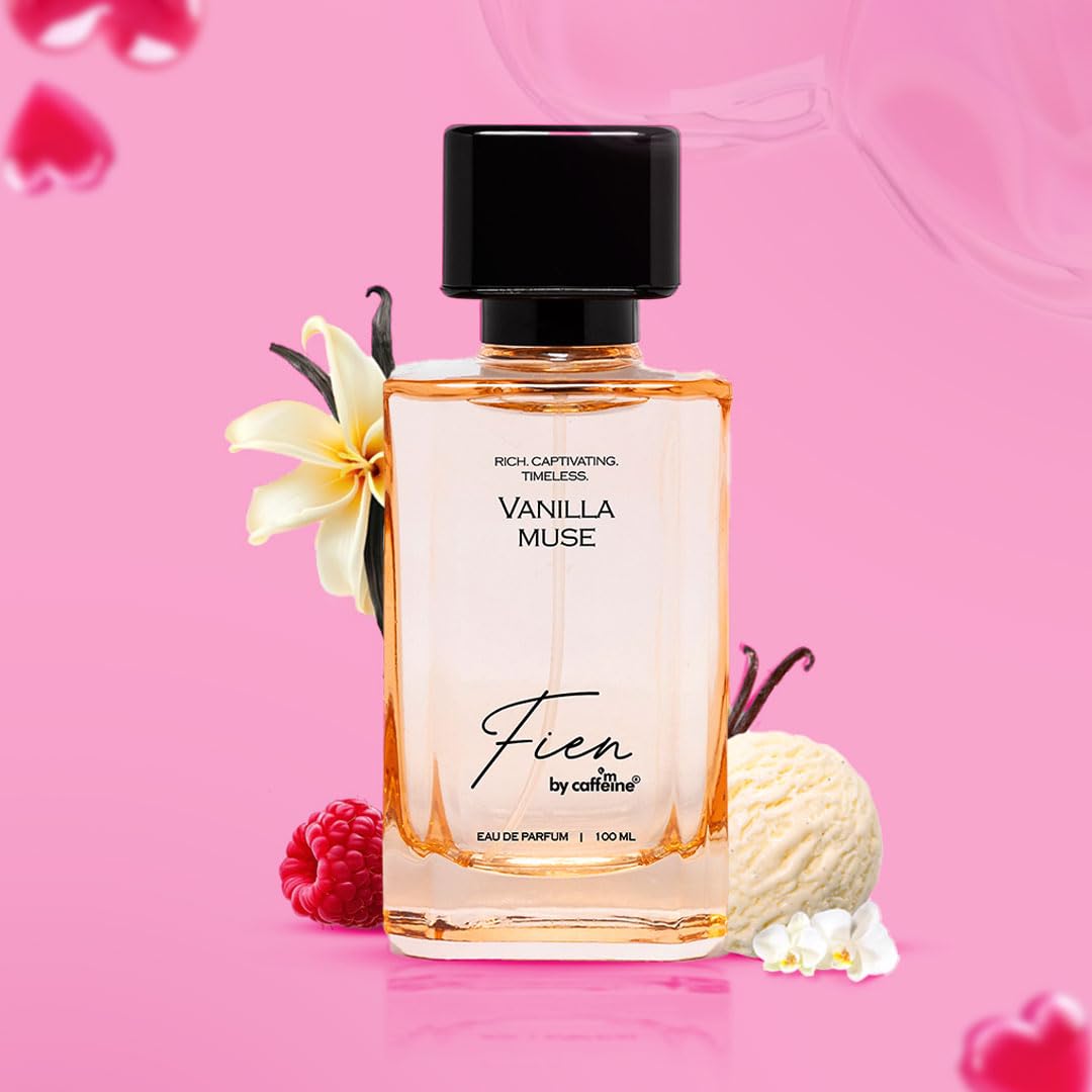 Perfume bottle labeled 'Vanilla Muse' with vanilla bean, raspberry, and flower on a pink background