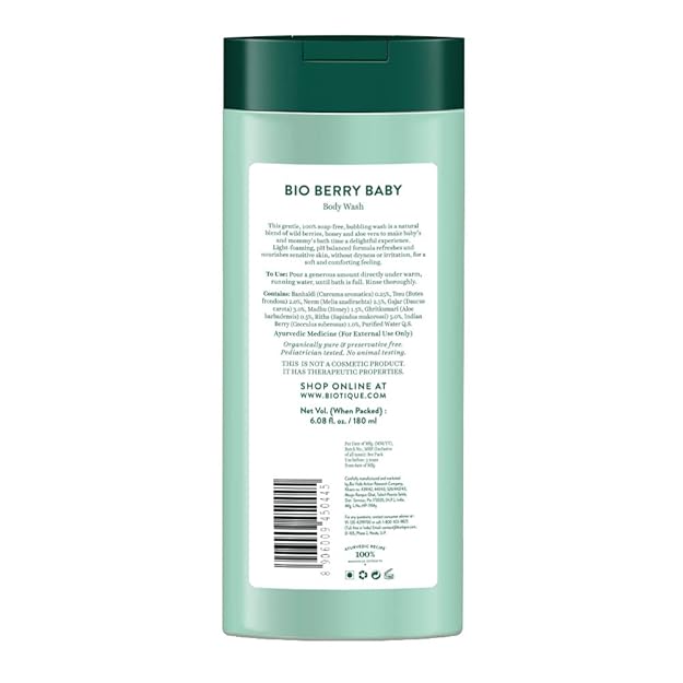 Back label of a green bottle with text and a barcode on a white background