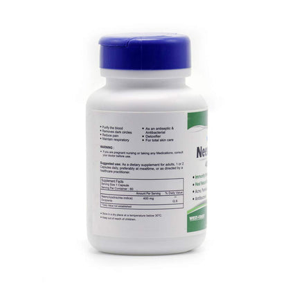 Supplement bottle with a blue cap on a white background