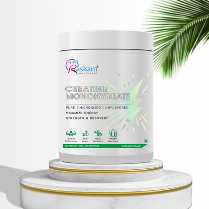 Container of Raskam Creatine Monohydrate on a white background with green leaves.