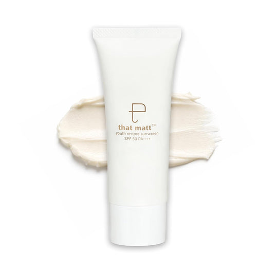 Tube of 'that matt' sunscreen with a swatch of cream on a white background