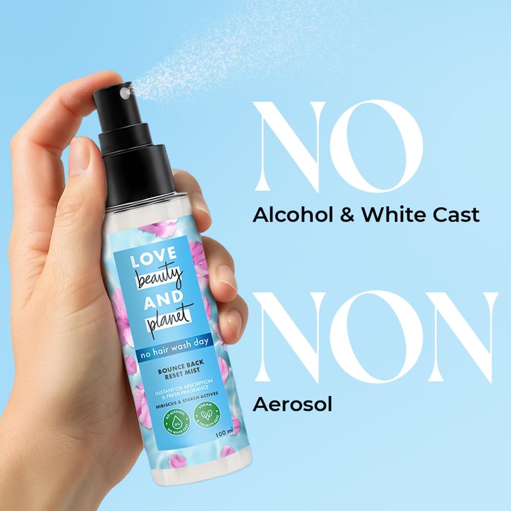 Hand holding a Love Beauty and Planet product with text on a blue background