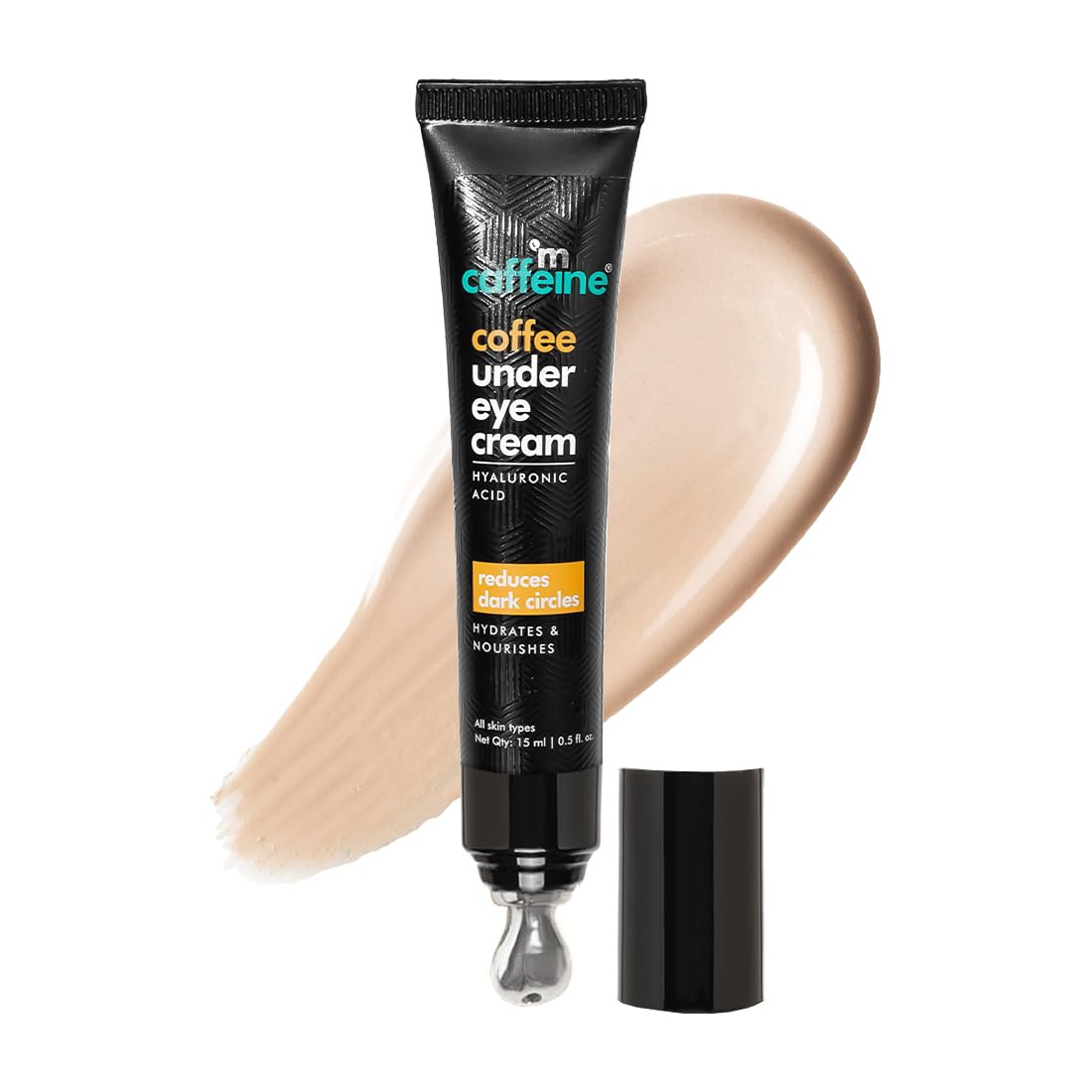 Tube of coffee under eye cream with a swatch on a white background