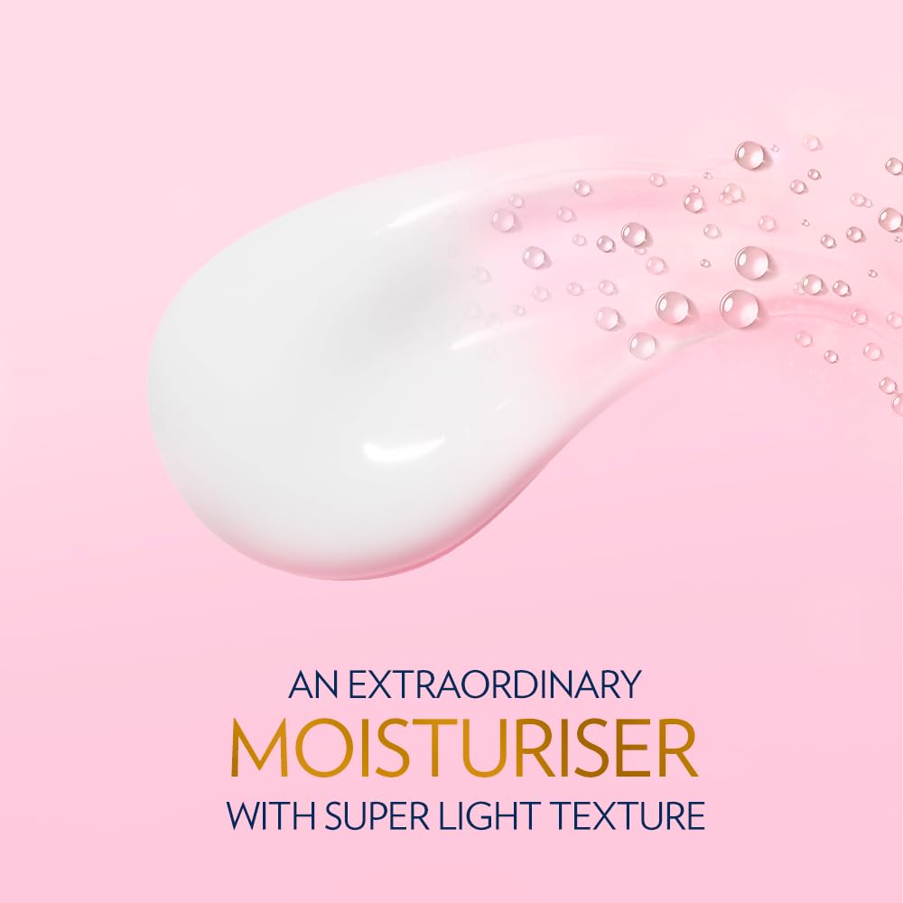 White moisturizer droplet with bubbles on a pink background, labeled as an extraordinary moisturizer with super light texture.
