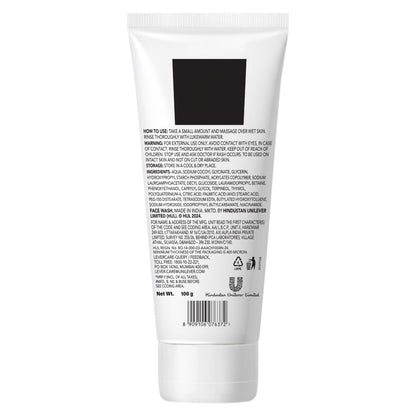 White tube of face wash with black label on a white background