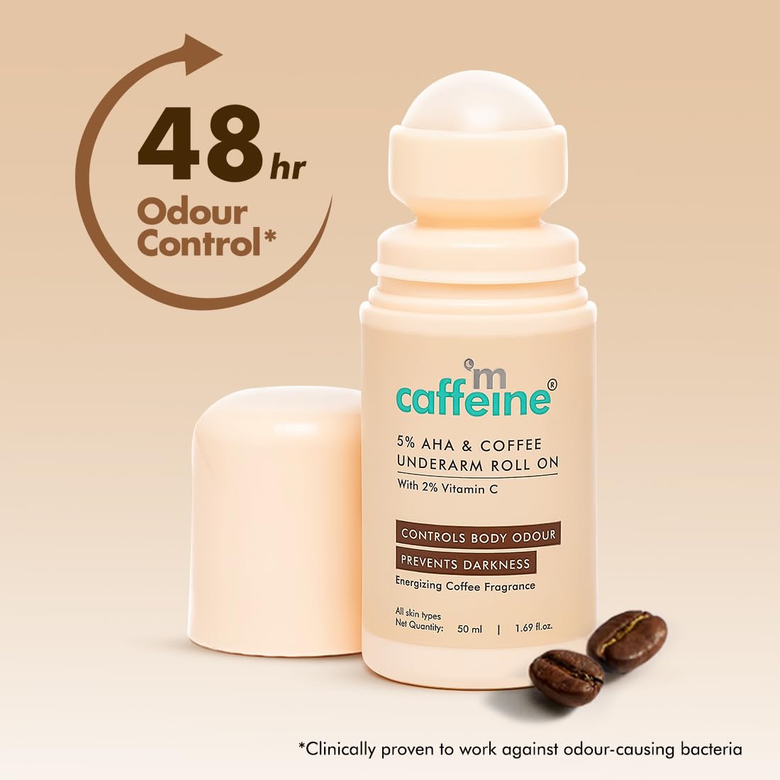 Caffeine underarm roll-on with coffee beans on a beige background