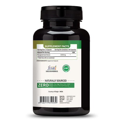Black supplement bottle with green label on a white background