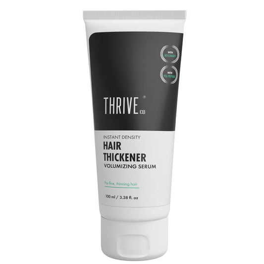 Tube of Thrive Co hair thickener on a white background
