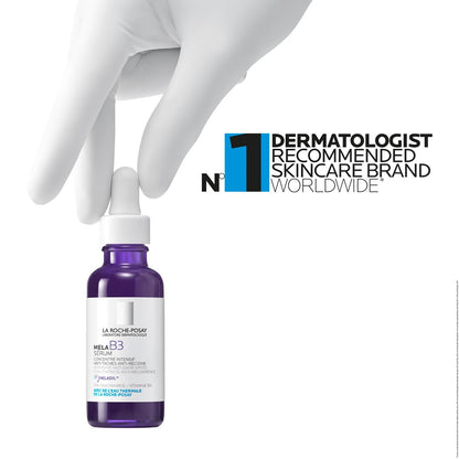Purple skincare bottle with dropper held by a gloved hand, branded as a dermatologist recommended skincare brand.