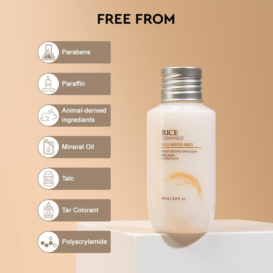 White bottle with silver cap on a beige background, featuring 'Free From' labels.