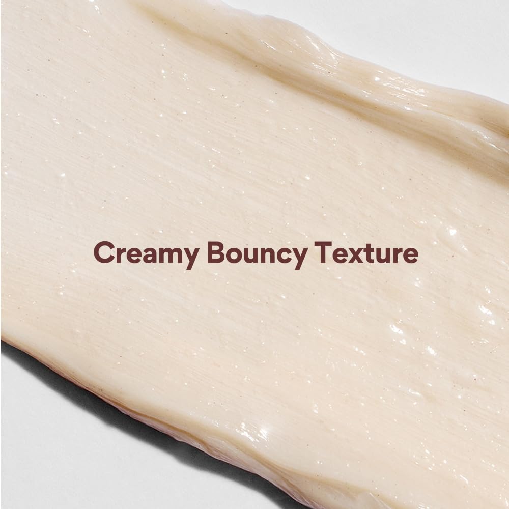 Close-up of a creamy bouncy texture with text overlay on a white background