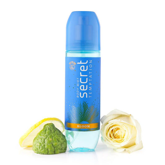 Secret deodorant spray bottle with lemon, bergamot, and rose on a white background