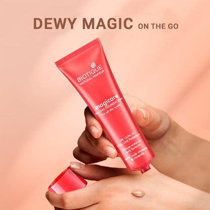 Biotique makeup product being held with 'DEWY MAGIC ON THE GO' text on a peach background